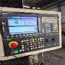 新定中捷12米动柱龙门一台，西门子828系统，工作台3米.